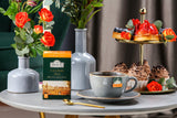 Ahmad Tea Ceylon Tea 20 Teabags - Box with hot cup of tea on the afternoon table