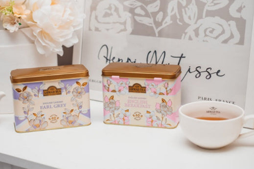 New floral caddies featuring classic English Breakfast and Earl Grey teas